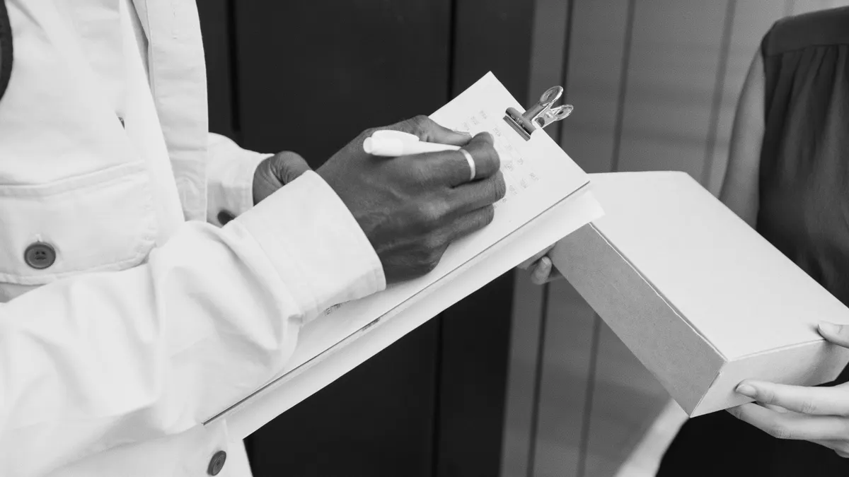 Content writing service packages explained — A Person Writing on White Paper